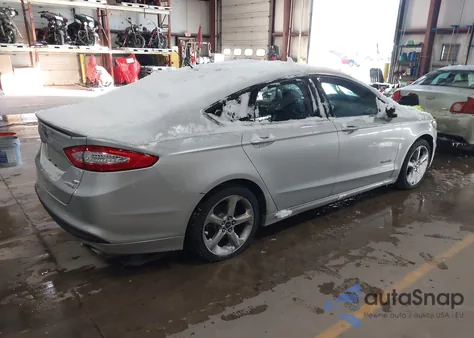 2013 Ford Fusion Hybrid Se z USA, uszkodzony, nr VIN 3FA6P0LU8DR226609